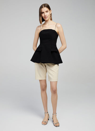 Black peplum top with pockets